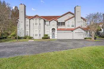 a large with a garage and a driveway at Windsor Highwoods Preserve, Tampa, 33647